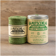 Greentwist nutscene twine shown in a bundle and dispersing tin.